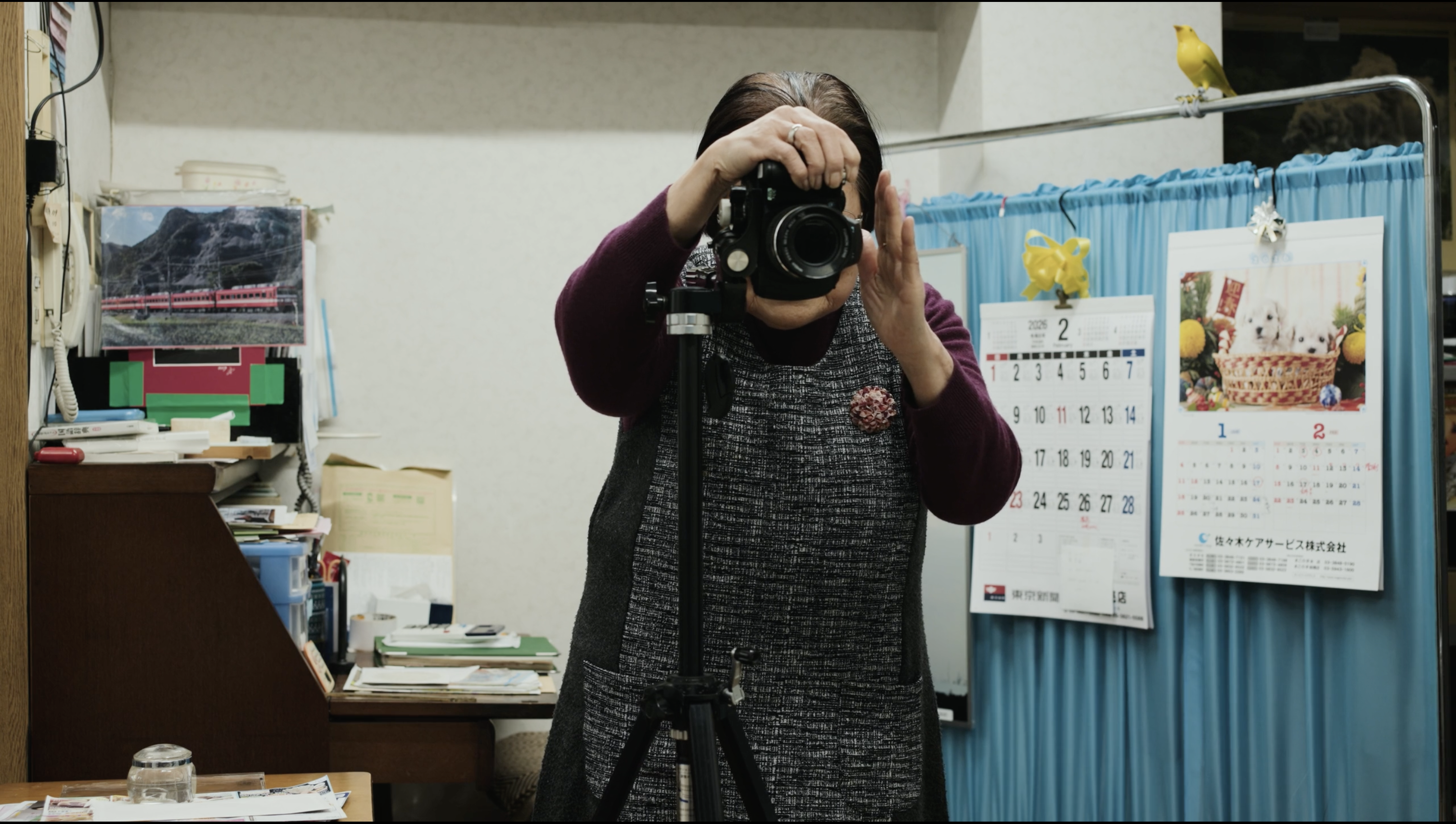 Masao Adachi Takes a Passport Photo